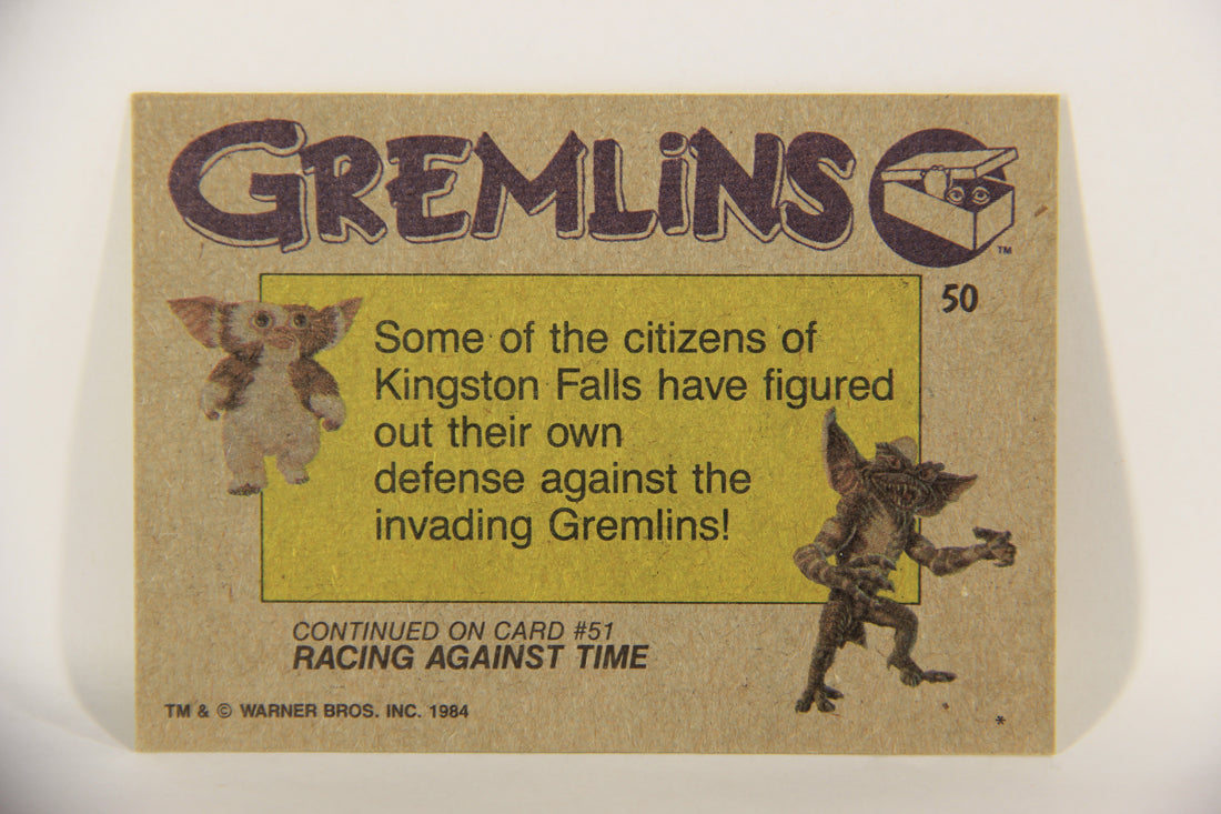Gremlins 1984 Trading Card #50 Sling-Shot Defense ENG Topps L016476