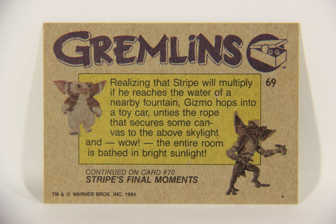 Gremlins 1984 Trading Card #69 Gizmo Saves The Day ENG Topps L016495