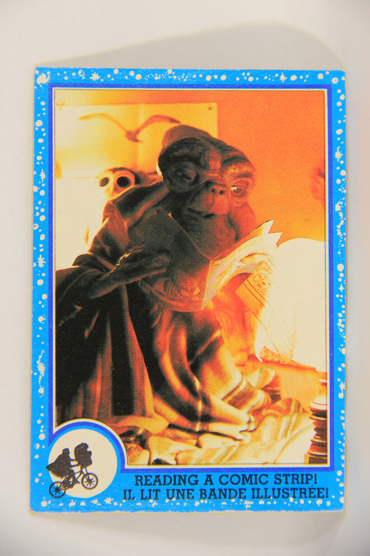 E.T. The Extra-Terrestrial 1982 Trading Card #16 Reading A Comic Strip FR-ENG OPC L018043