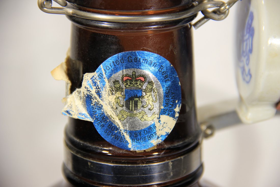 Vintage German Beer Brown Bottle With Metal Handle And Porcelain Top L001831