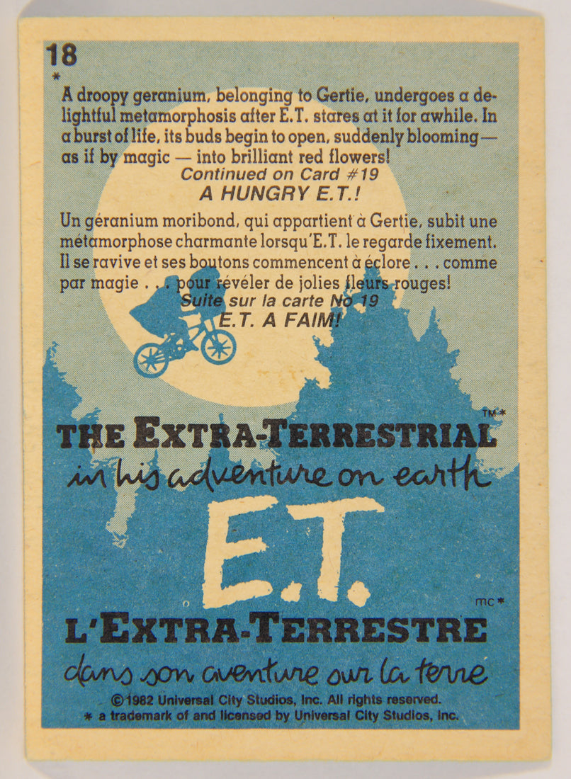 E.T. The Extra-Terrestrial 1982 Trading Card #18 E.T. And The Flower FR-ENG OPC L001796