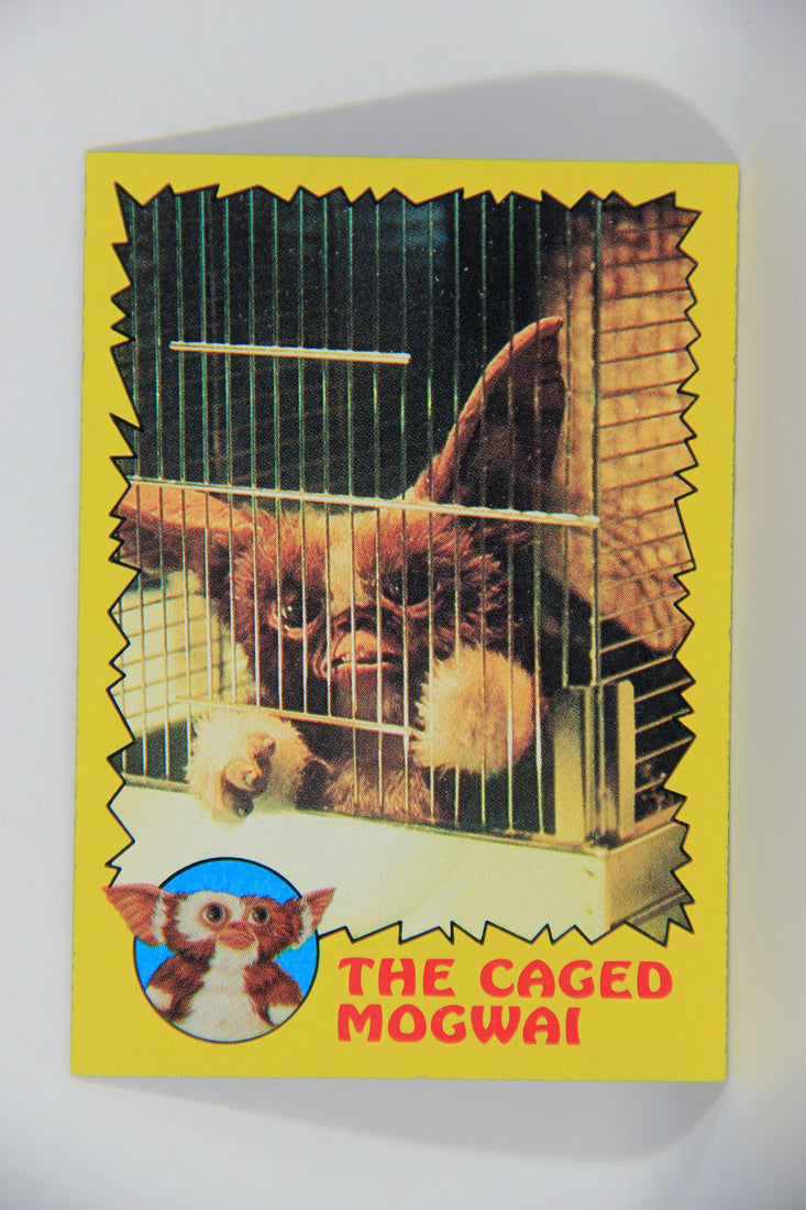 Gremlins 1984 Trading Card #32 The Caged Mogwai ENG Topps L016458