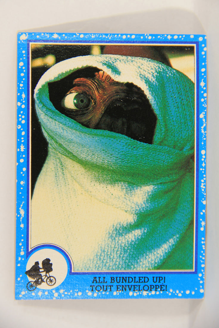 E.T. The Extra-Terrestrial 1982 Trading Card #61 All Bundled Up FR-ENG OPC L018088