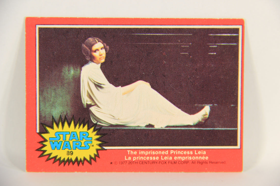 Star Wars 1977 Trading Card #89 The Imprisoned Princess Leia FR-ENG OPC L018779