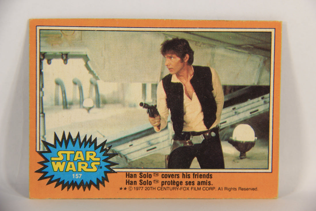 Star Wars 1977 Trading Card #157 Han Solo Covers His Friends FR-ENG OPC L018833