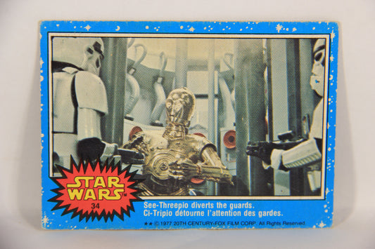 Star Wars 1977 Trading Card #34 See-Threepio Diverts The Guards FR-ENG OPC L019212