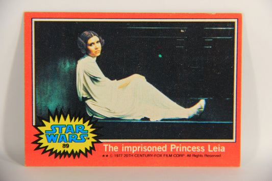 Star Wars 1977 Trading Card #89 The Imprisoned Princess Leia ENG Topps L019902