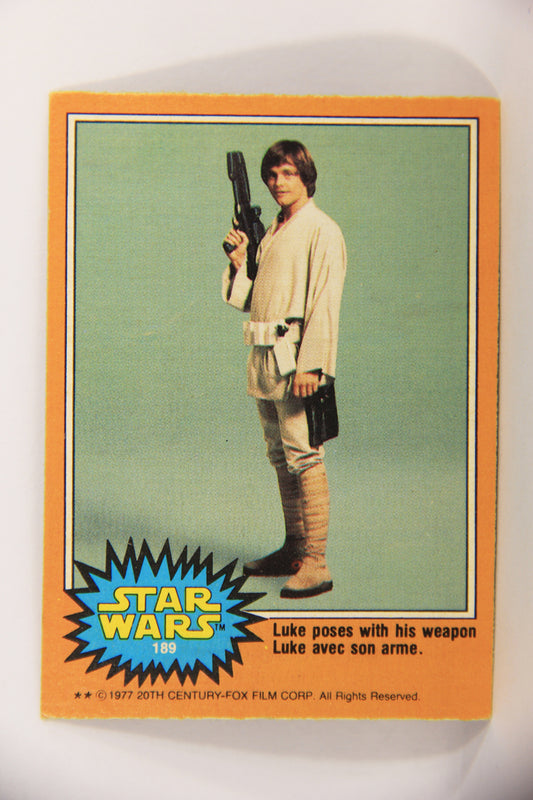 Star Wars 1977 Trading Card #189 Luke Poses With His Weapon FR-ENG OPC L020027
