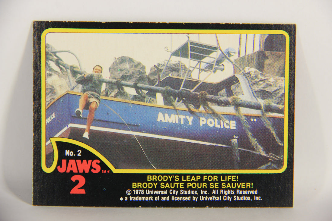 Jaws 2 - 1978 Trading Card #2 Brody's Leap For Life FR-ENG O-Pee-Chee L020897
