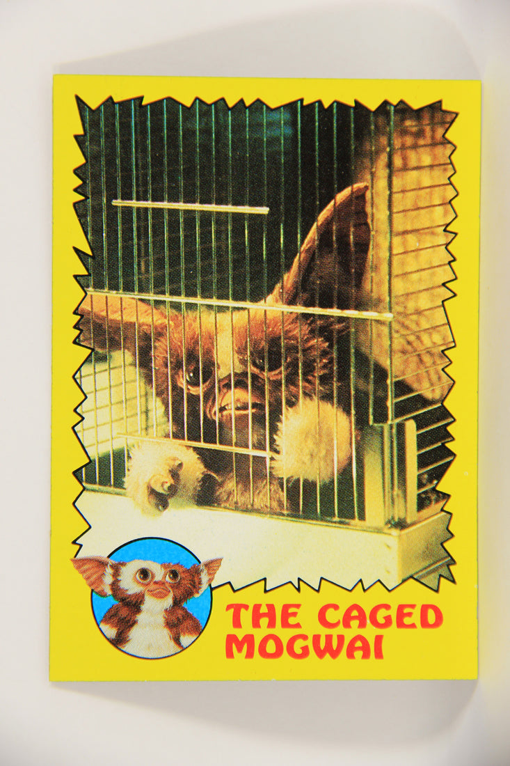Gremlins 1984 Trading Card #32 The Caged Mogwai ENG Topps L021147