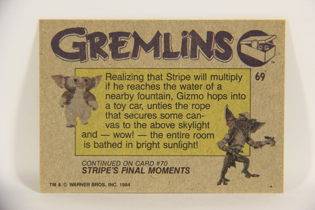 Gremlins 1984 Trading Card #69 Gizmo Saves The Day ENG Topps L021184