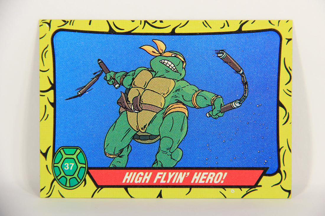 Teenage Mutant Ninja Turtles 1989 Trading Card #37 High Flyin' Hero ENG L021864